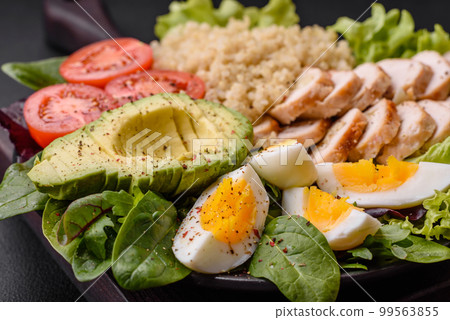 Delicious healthy lunch consisting of chicken, avocado, quinoa, eggs and tomatoes Delicious healthy lunch consisting of chicken, avocado, quinoa, eggs and tomatoes 99563855