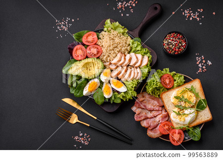 Delicious healthy lunch consisting of chicken, avocado, quinoa, eggs and tomatoes Delicious healthy lunch consisting of chicken, avocado, quinoa, eggs and tomatoes 99563889
