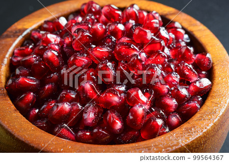 Burning candles on table on black background indoors Burning candles on table on black background indoors 99564367