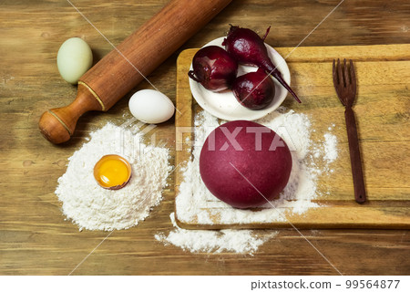 Purple dough bun for noodles with ingredients on the table. Purple dough bun for noodles with ingredients on the table. 99564877