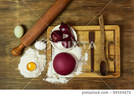 Purple dough bun for noodles with ingredients on the table. Purple dough bun for noodles with ingredients on the table. 99564878