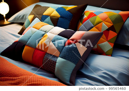 Interior of a living room with a sofa covered with patchwork pillows Interior of a living room with a sofa covered with patchwork pillows 99565460