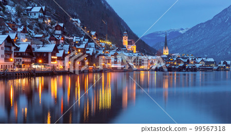 Hallstatt. Scenic view of the city and the lake at sunset. 99567318
