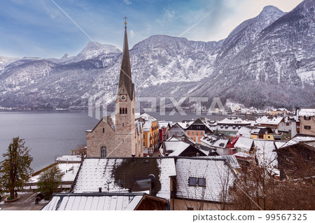 Hallstatt. Scenic view of the city and the lake at sunset. 99567325