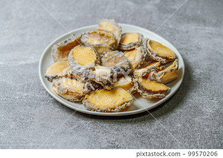 Seafood ingredients raw abalone on a plate 99570206