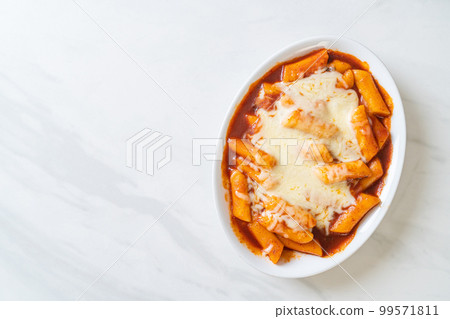 Korean rice cake in spicy Korean sauce with cheese, Cheese Tokpokki, Tteokbokki with Cheese Korean rice cake in spicy Korean sauce with cheese, Cheese Tokpokki, Tteokbokki with Cheese 99571811