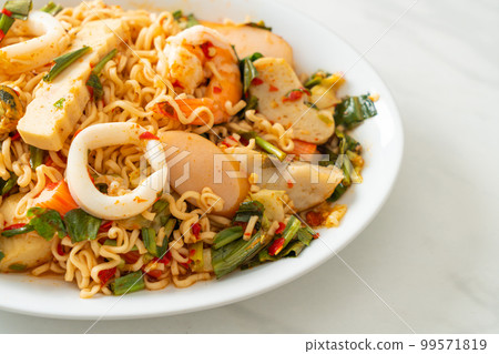 Instant noodle spicy salad with mixed meats Instant noodle spicy salad with mixed meats 99571819