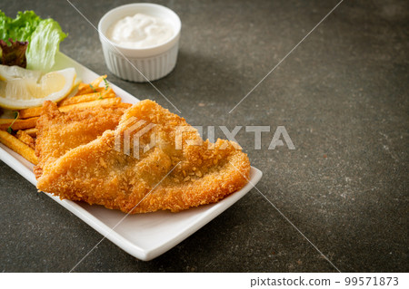 fish and chips - fried fish fillet with potatoes chips 99571873