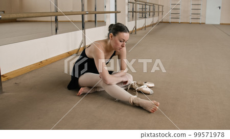 Female ballet dancer finished choreography rehearsal 99571978