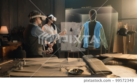 Tailor and customer watch 3D hologram of clothes pattern 99572349