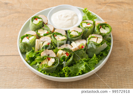 vegetables wrap or salad rolls with creamy salad sauce 99572918