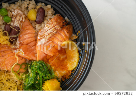 grilled salmon with brown rice donburi 99572932