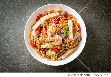 Instant noodles spicy salad on plate 99572933
