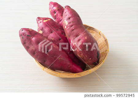 Japanese sweet potatoes on basket Japanese sweet potatoes on basket 99572945