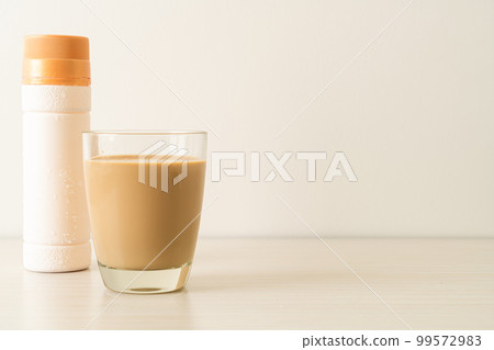 coffee latte glass with ready to drink coffee bottles 99572983