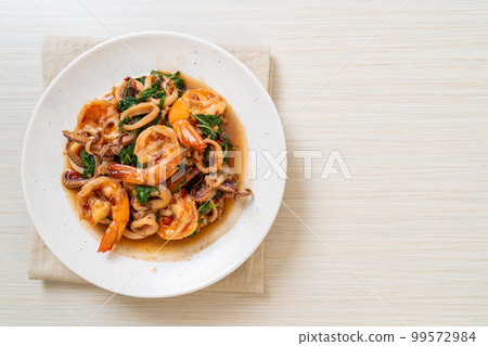 stir-fried seafood with Thai basil 99572984