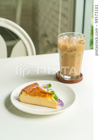 Basque Burnt Cheesecake on plate Basque Burnt Cheesecake on plate 99573181