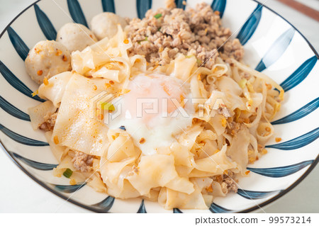dried spicy noodles with minced pork, meatballs and egg dried spicy noodles with minced pork, meatballs and egg 99573214