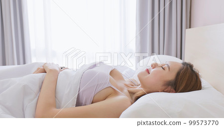 Woman sleep well in morning 99573770