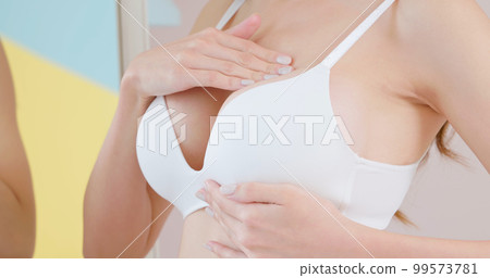 Breast cancer self check concept 99573781
