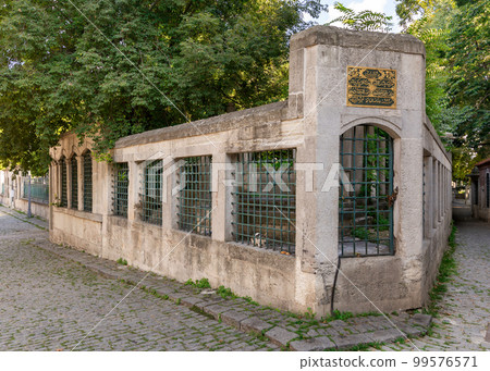 Cobblestone alley at Eyup Sultan Cemetery, near Eyup Sultan Mosque at Eyup district, Golden Horn, Istanbul, Turkey 99576571