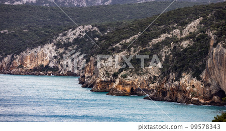 Rocky coast near Cala Gonone, Sardinia. Nature Background 99578343