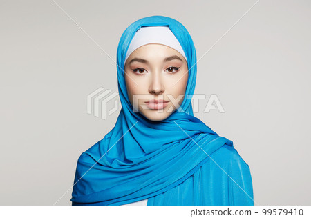 beautiful asian young woman with Make-up. beauty girl in hijab beautiful asian young woman with Make-up. beauty girl in hijab 99579410