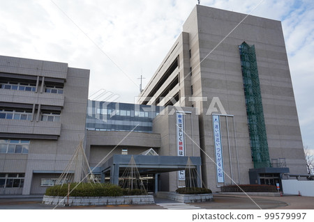 Winter sky and Komatsu city government building | City hall image | Photographed in February | Komatsu city, Ishikawa prefecture 99579997