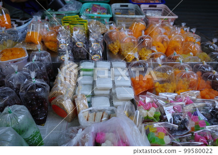 Food for sale at Maeklong Railway Market in Thailand Food for sale at Maeklong Railway Market in Thailand 99580022
