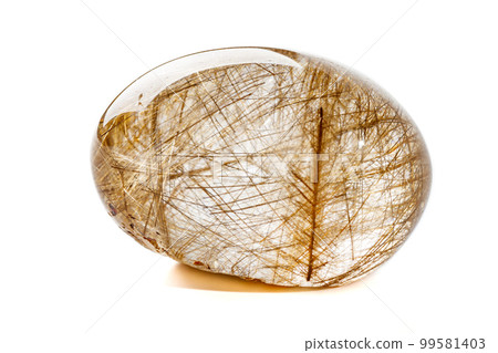 Macro mineral quartz hairy stone, quartz with rutile on a white background Macro mineral quartz hairy stone, quartz with rutile on a white background 99581403