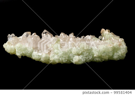 Macro mineral stone Prehnite quartz on a black background Macro mineral stone Prehnite quartz on a black background 99581404