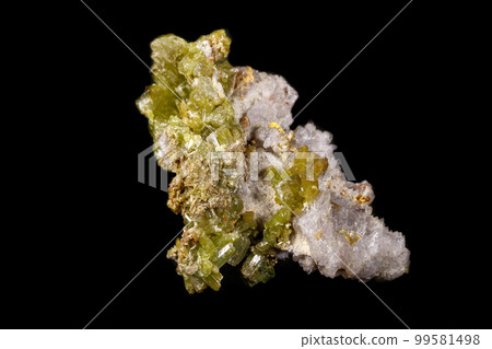 Macro Pyromorphite mineral stone on a black background Macro Pyromorphite mineral stone on a black background 99581498
