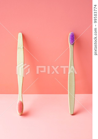 Natural bamboo toothbrushes. Dental care concept Natural bamboo toothbrushes. Dental care concept 99583774