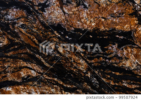 Black Magma granite texture in dark brown tone for design. Black Magma granite texture in dark brown tone for design. 99587924