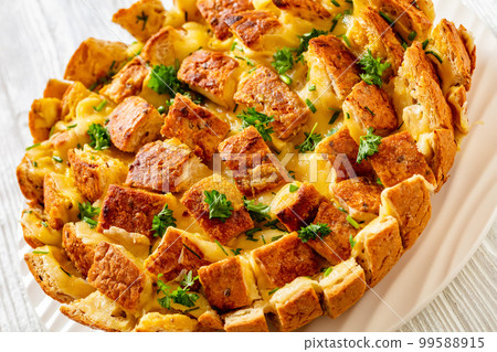 cheesy garlic bread, pull apart bread, top view cheesy garlic bread, pull apart bread, top view 99588915