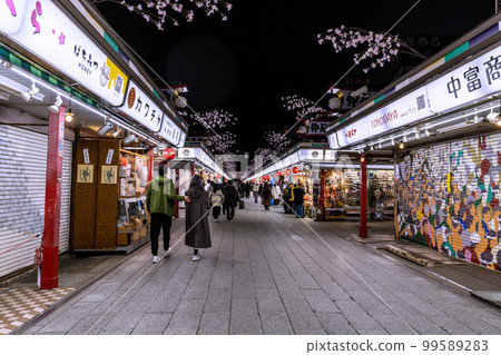 Tokyo cityscape in Japan Sensoji Temple. Nakamise shopping street at night 99589283