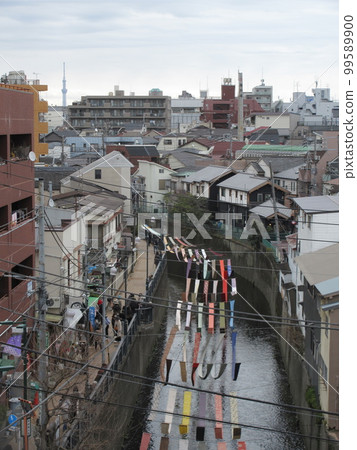 Dyed goods lined up along the Myoshoji River on the Dyeing Path Dyed goods lined up along the Myoshoji River on the Dyeing Path 99589900
