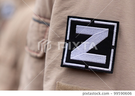Logo with the letter Z on the shoulder of the military. Logo with the letter Z on the shoulder of the military. 99590606