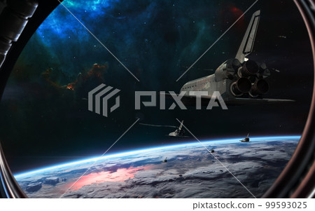 Space shuttles in orbit of planet Earth. View from porthole. Solar system Space shuttles in orbit of planet Earth. View from porthole. Solar system 99593025