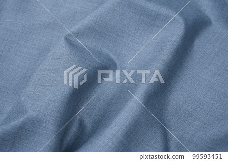 Close-up of plain grey blue fabric cloth texture. Abstract background of monochromatic textile material and texture for design. Copy space. Close-up of plain grey blue fabric cloth texture. Abstract background of monochromatic textile material and texture for design. Copy space. 99593451