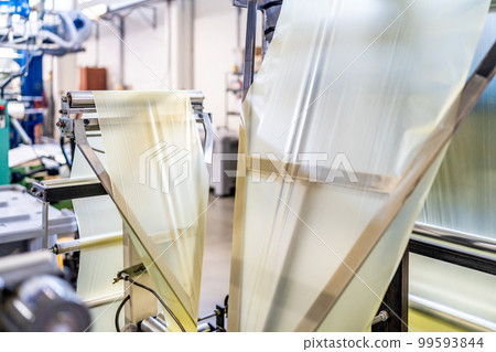 production of plastic packaging materials in the factory production of plastic packaging materials in the factory 99593844