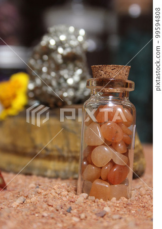 Pyrite Rocks and Crystals on Australian Red Sand Pyrite Rocks and Crystals on Australian Red Sand 99594808