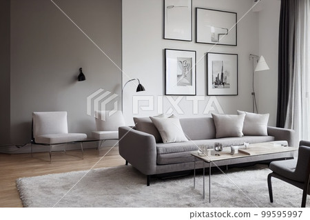 Stylish scandinavian living room with design mint sofa, furnitures, mock up poster map, plants and elegant personal accessories. Modern home decor. Bright and sunny room. Generative AI illustration. 99595997