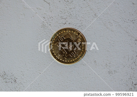 Bitcoin gold coin mining trading concept on concrete background. BTC golden money. Worldwide virtual internet Cryptocurrency or crypto digital payment system. Digital coin money farm Bitcoin gold coin mining trading concept on concrete background. BTC golden money. Worldwide virtual internet Cryptocurrency or crypto digital payment system. Digital coin money farm 99596921