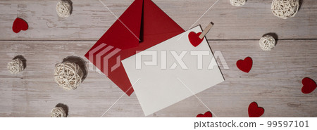 Banner Greeting or invitation card mock up with red envelope on wooden background. Romantic Small hearts Valentine day. Blank paper card copy space for your text. Holiday morning Banner Greeting or invitation card mock up with red envelope on wooden background. Romantic Small hearts Valentine day. Blank paper card copy space for your text. Holiday morning 99597101