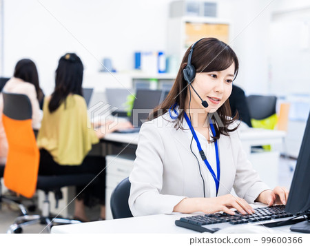 Woman having a remote meeting in the office Woman having a remote meeting in the office 99600366