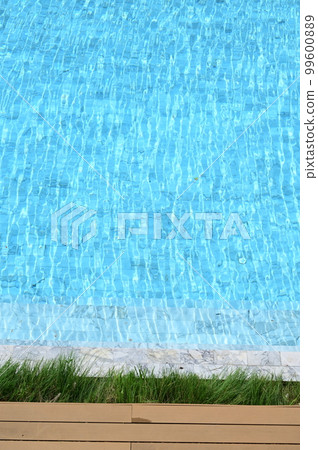 swimming pool in hotel, blue texture background 99600889
