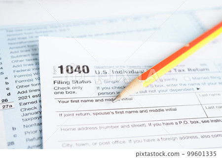 Tax form 1040 U.S. Individual Income Tax Return, business finance concept. Tax form 1040 U.S. Individual Income Tax Return, business finance concept. 99601335