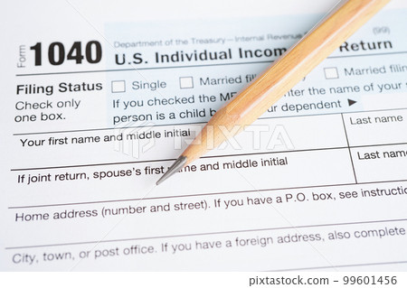 Tax form 1040 U.S. Individual Income Tax Return, business finance concept. Tax form 1040 U.S. Individual Income Tax Return, business finance concept. 99601456
