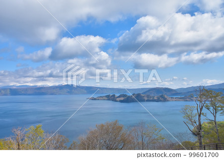 Aomori Lake Towada with blue sky and fresh greenery 99601700